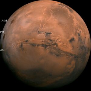 A mosaic composition of Mars, Valles Marineris, and the three shield volcanoes atop Tharsis Bulge, taken by Viking Orbiter 1. The Valles canyon system headwaters flowed from the Tharsis Bulge; A dendritic fluvial drainage system of small channels appears to be part of the headwaters. The three shield volcanoes atop Tharsis Bulge are AM = Arsia Mons; PM = Pavonis Mons; AsM = Ascraeus Mons. Image credit: NASA/JPL-Caltech